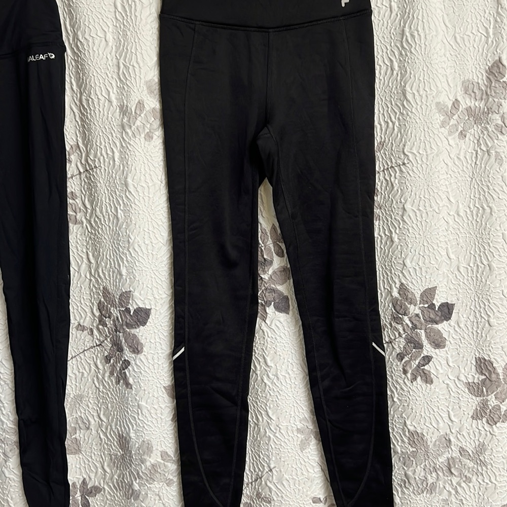 Never worn Fila lined workout/running leggings xs